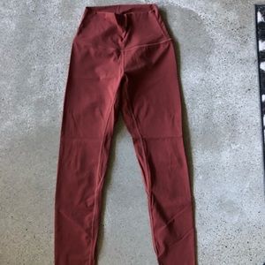 Born Primitive “your go to legging” brick red